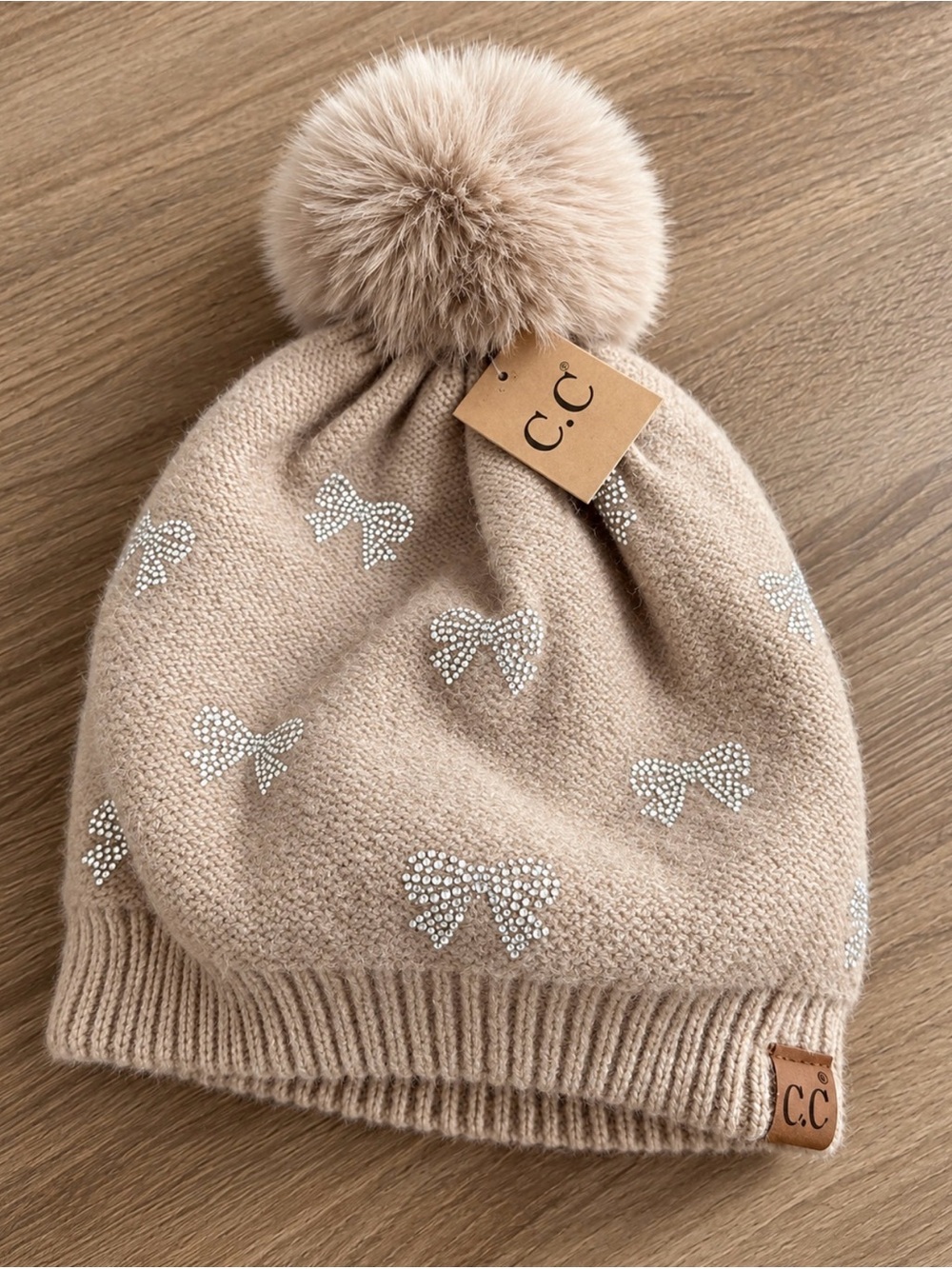C.C Taupe Pom Pom Beanie with Rhinestone Bows